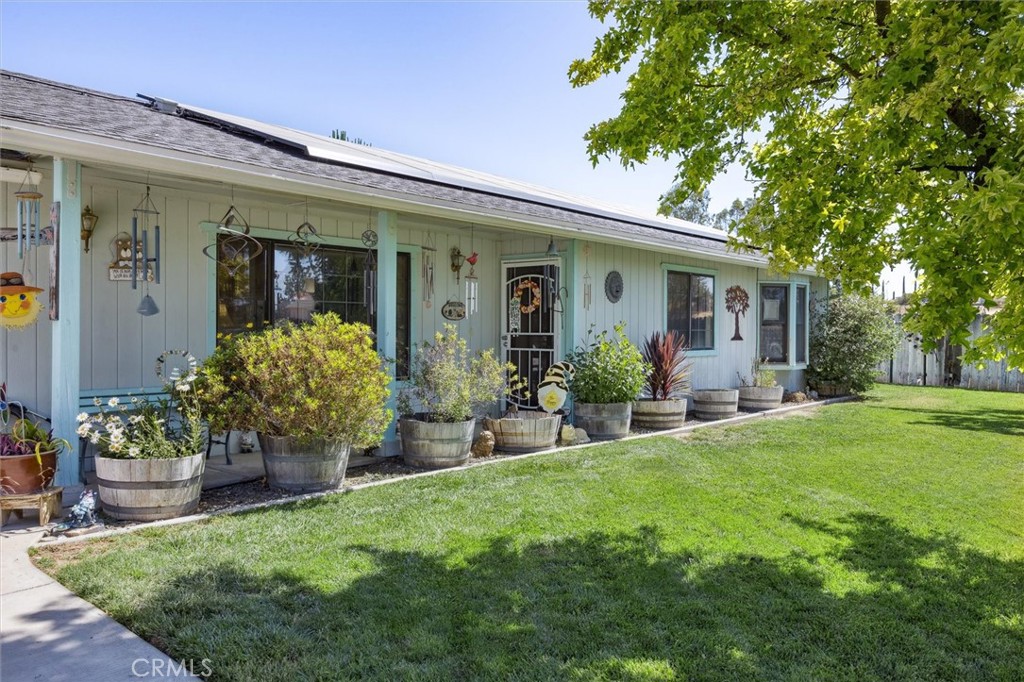 7050 Shale Rock Road Paso Robles, CA 93446 - Photo 1 of 45 a front view of house with yard and outdoor seating