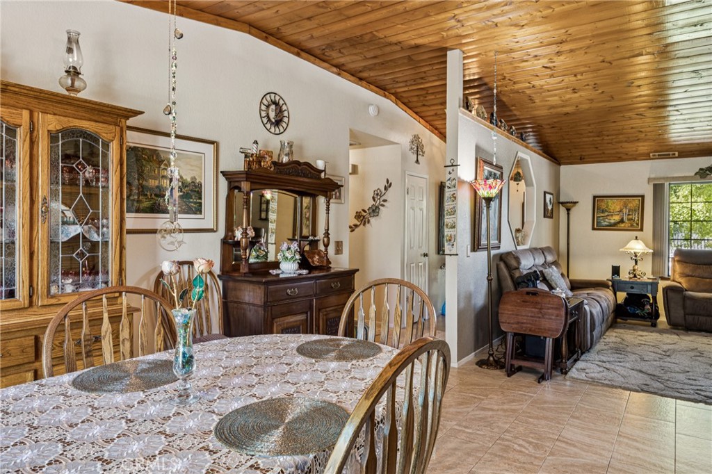 7050 Shale Rock Road Paso Robles, CA 93446 - Photo 11 of 45 a view of a dining room with furniture