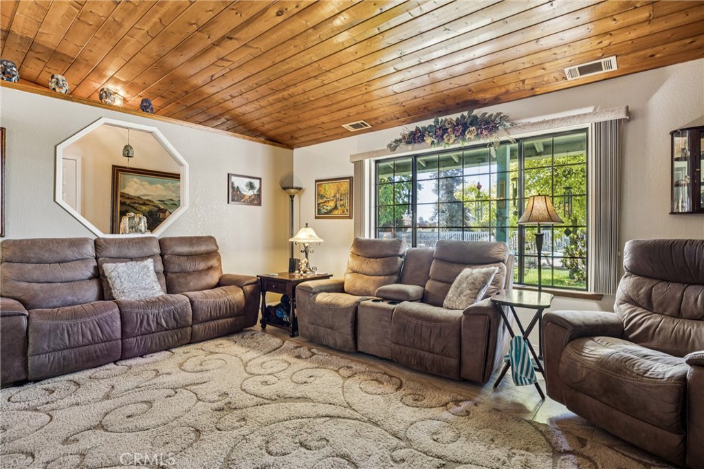 7050 Shale Rock Road Paso Robles, CA 93446 - Photo 15 of 45 a living room with furniture and a large window