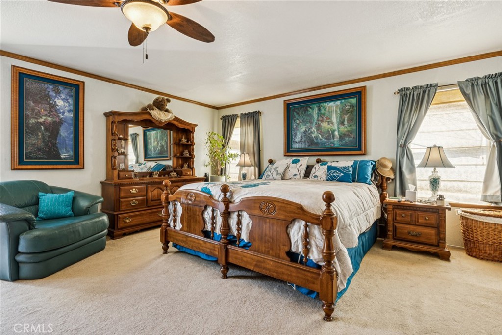 7050 Shale Rock Road Paso Robles, CA 93446 - Photo 16 of 45 a bedroom with a bed couch and window