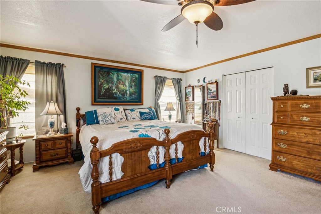 7050 Shale Rock Road Paso Robles, CA 93446 - Photo 18 of 45 a bedroom with a bed dresser and a window