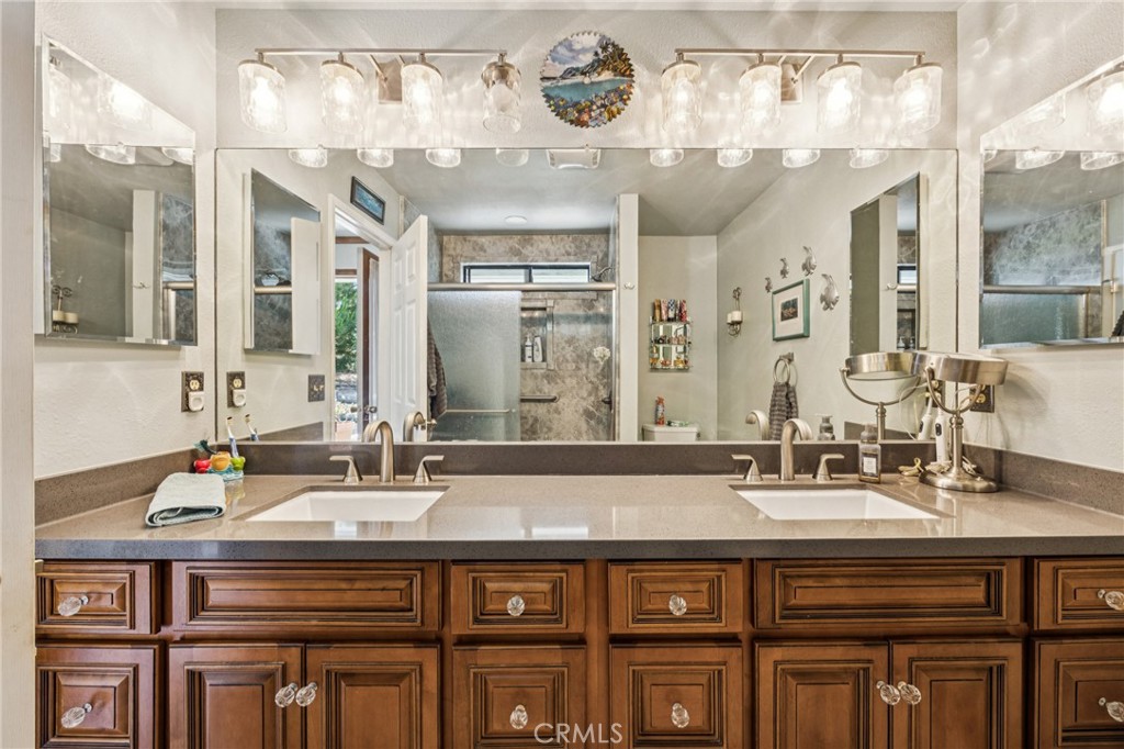 7050 Shale Rock Road Paso Robles, CA 93446 - Photo 19 of 45 a bathroom with a sink double vanity and a mirror