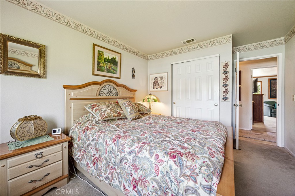 7050 Shale Rock Road Paso Robles, CA 93446 - Photo 23 of 45 a bedroom with a bed and a window