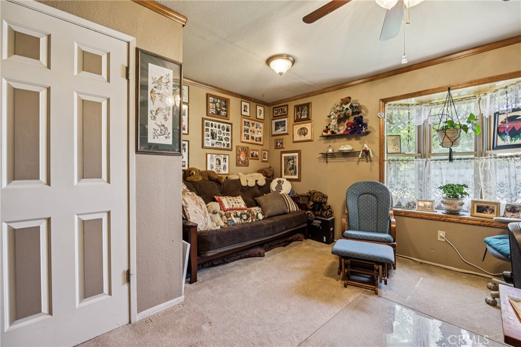 7050 Shale Rock Road Paso Robles, CA 93446 - Photo 24 of 45 a living room with furniture and a gate