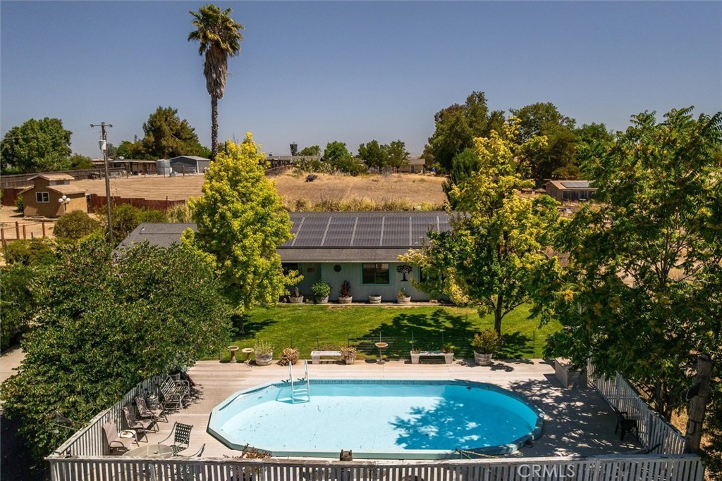 7050 Shale Rock Road Paso Robles, CA 93446 - Photo 3 of 45 a view of a swimming pool with a yard