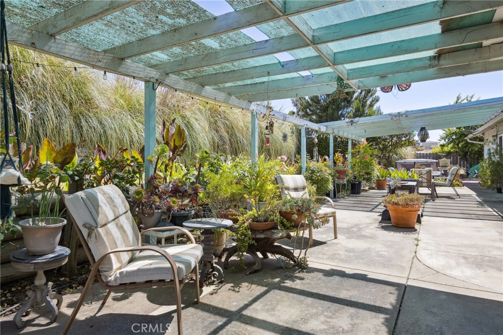 7050 Shale Rock Road Paso Robles, CA 93446 - Photo 32 of 45 a view of a patio with chairs and potted plants