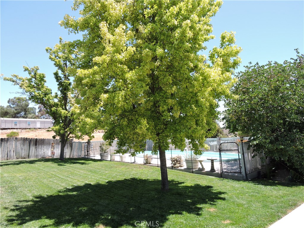 7050 Shale Rock Road Paso Robles, CA 93446 - Photo 34 of 45 a front view of a house with a garden