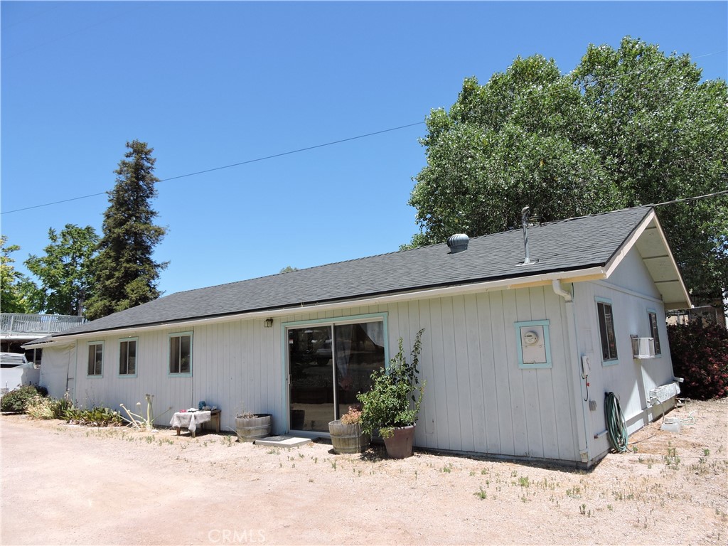 7050 Shale Rock Road Paso Robles, CA 93446 - Photo 35 of 45 a front view of a house with a yard