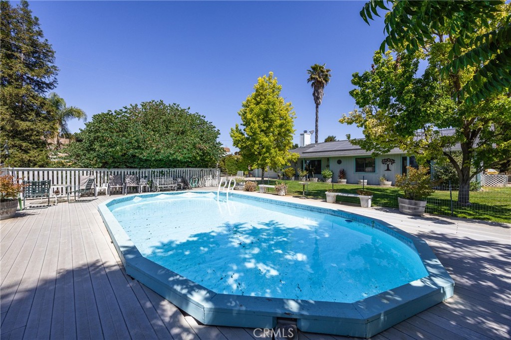 7050 Shale Rock Road Paso Robles, CA 93446 - Photo 38 of 45 a view of a swimming pool with a patio