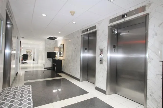 a view of a kitchen with furniture and a fireplace