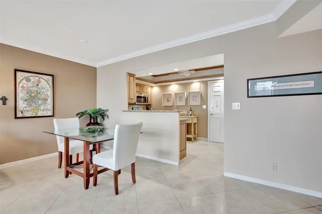 a kitchen with stainless steel appliances granite countertop a sink stove oven and cabinets