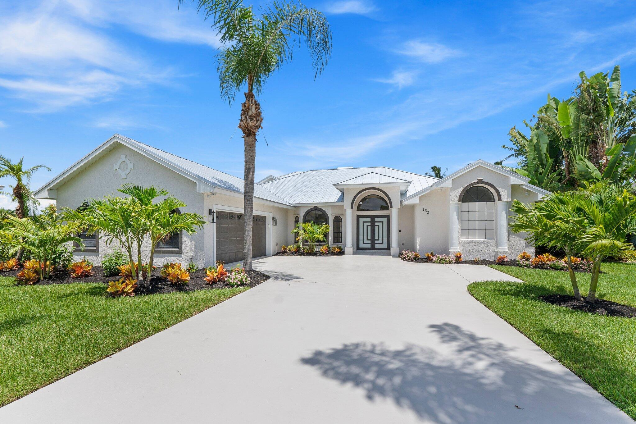 163 Southeast Osprey Ridge Port St. Lucie, FL 34984 - Photo 2 of 111 Front3