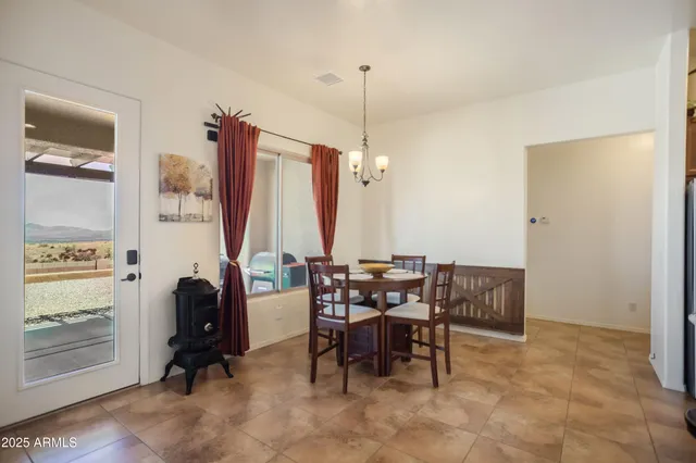 a view of a livingroom with furniture and window