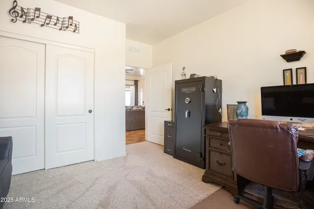 a view of a livingroom with furniture