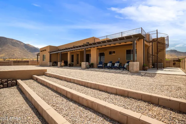 a view of swimming pool with lake view and mountain view