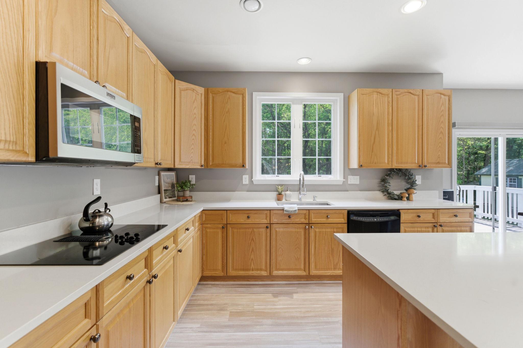 457 Hughs Road Charles Town, WV 25414 - Photo 18 of 73 Bright and inviting space with new countertops.
