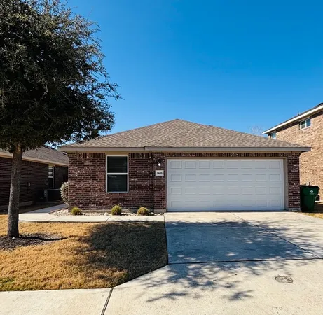 a front view of a house with yard