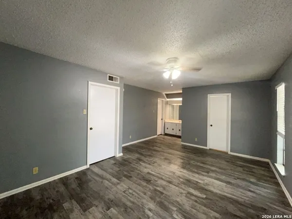 a view of an empty room and window