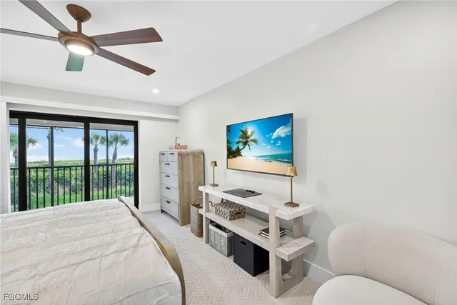 a bedroom with furniture and a window