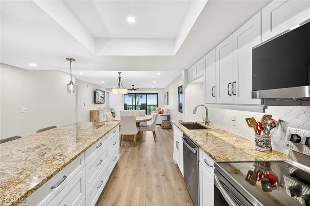 a kitchen with granite countertop lots of counter top space