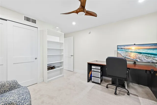 a room with a chair and a window