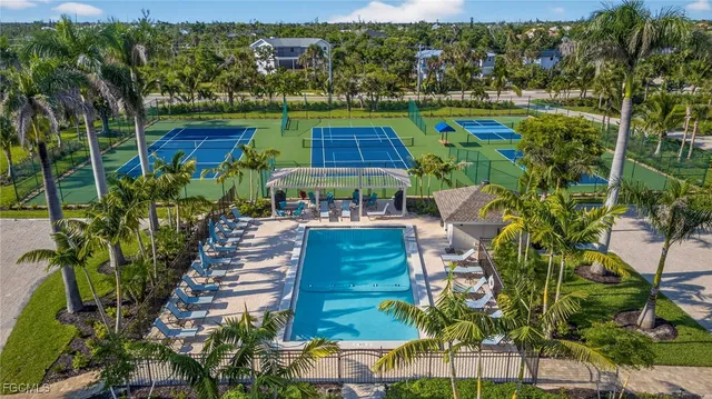 a view of outdoor space with seating area and green space