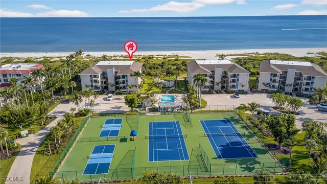 a view of swimming pool with outdoor seating