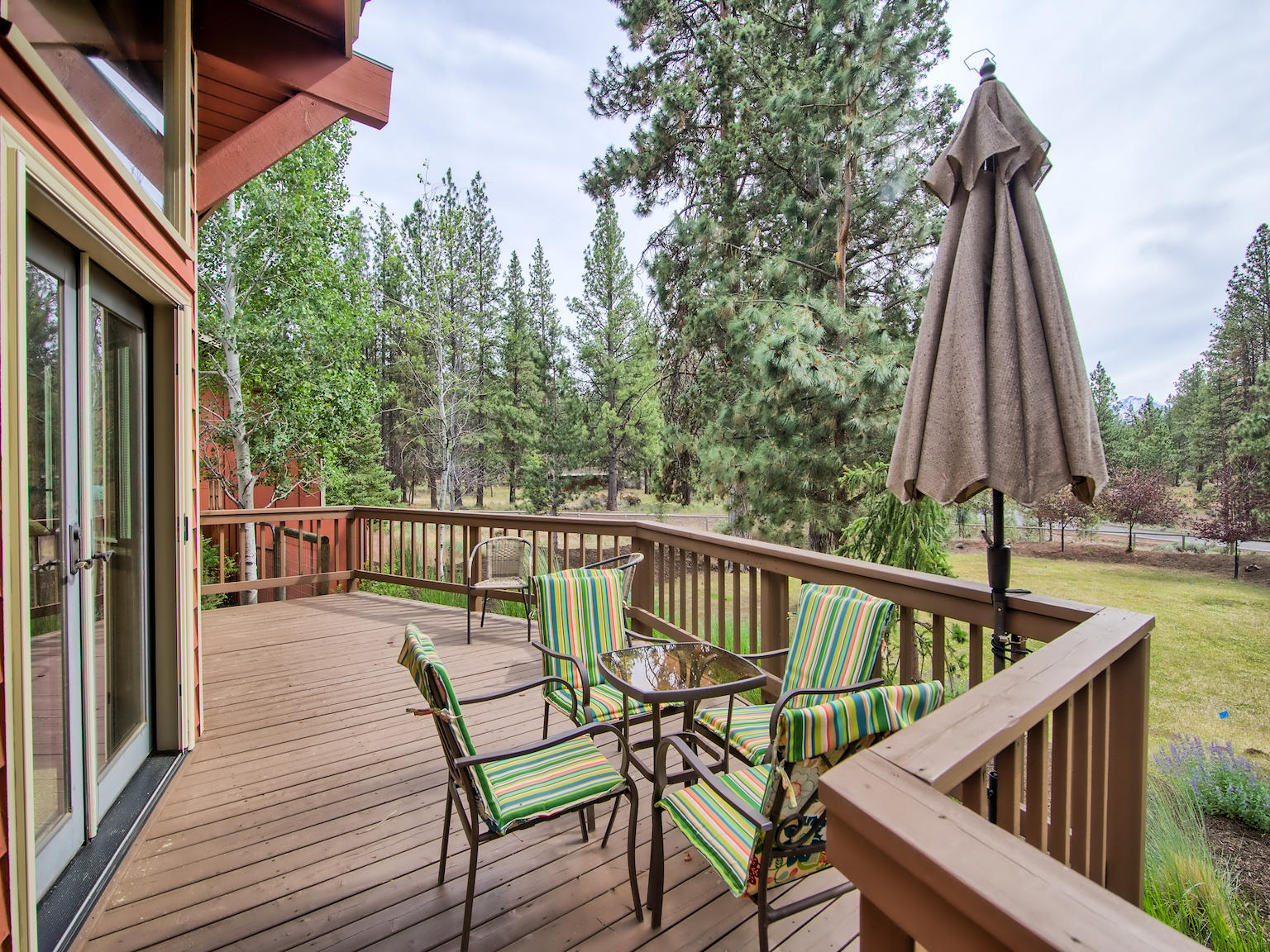69767 Pine Ridge Road Sisters, OR 97759 - Photo 28 of 31 Wonderful decking across the back of this home.