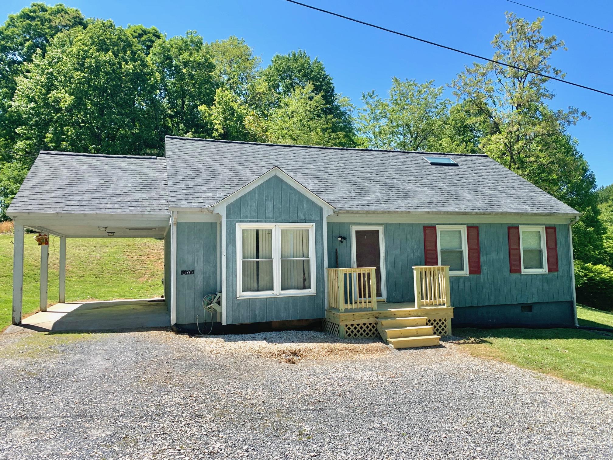 570 Zimmerman Road Blue Ridge, VA 24064 - Photo 1 of 24 front view of a house with a yard