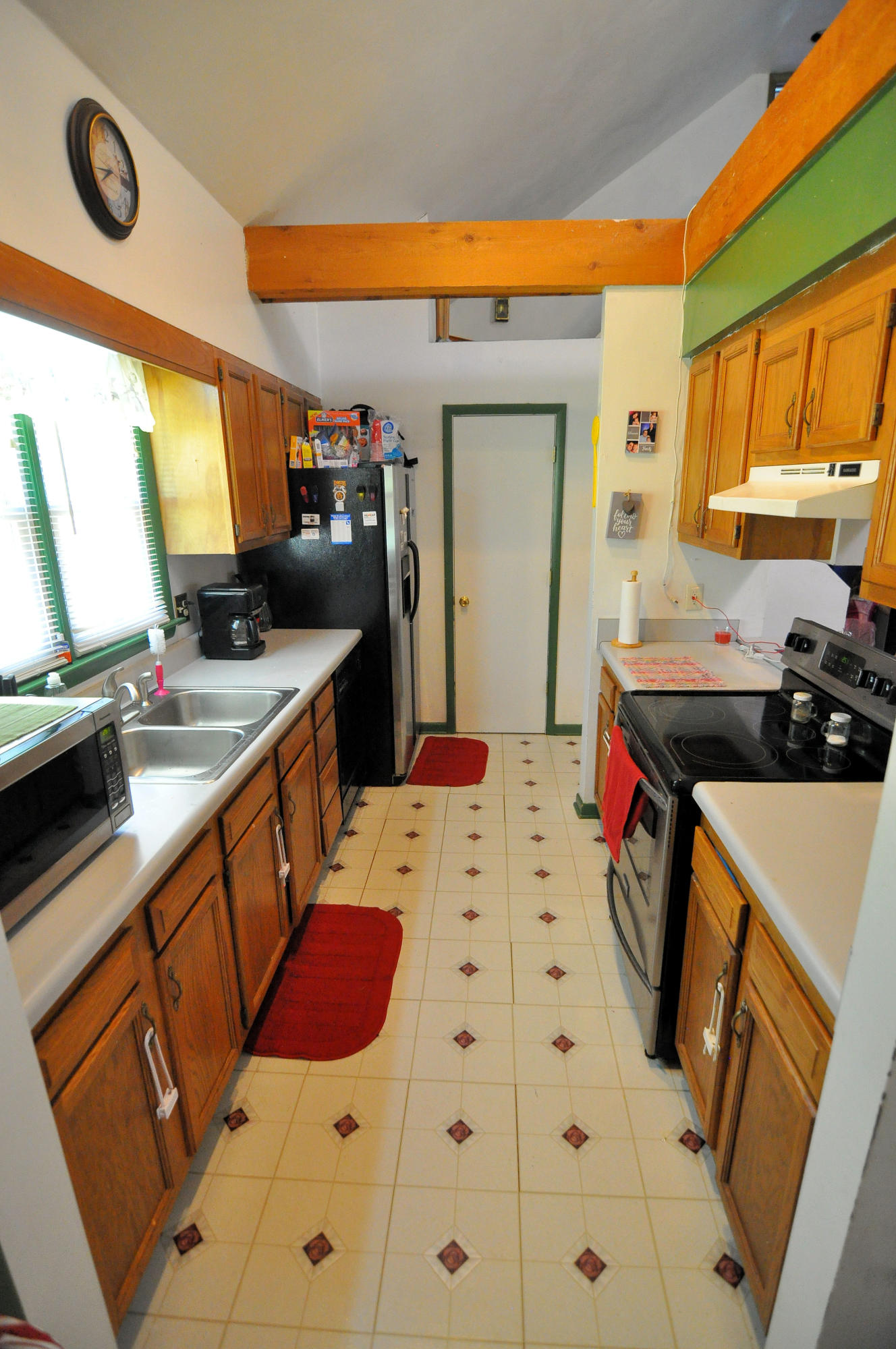 570 Zimmerman Road Blue Ridge, VA 24064 - Photo 16 of 24 a kitchen that has a sink and a stove