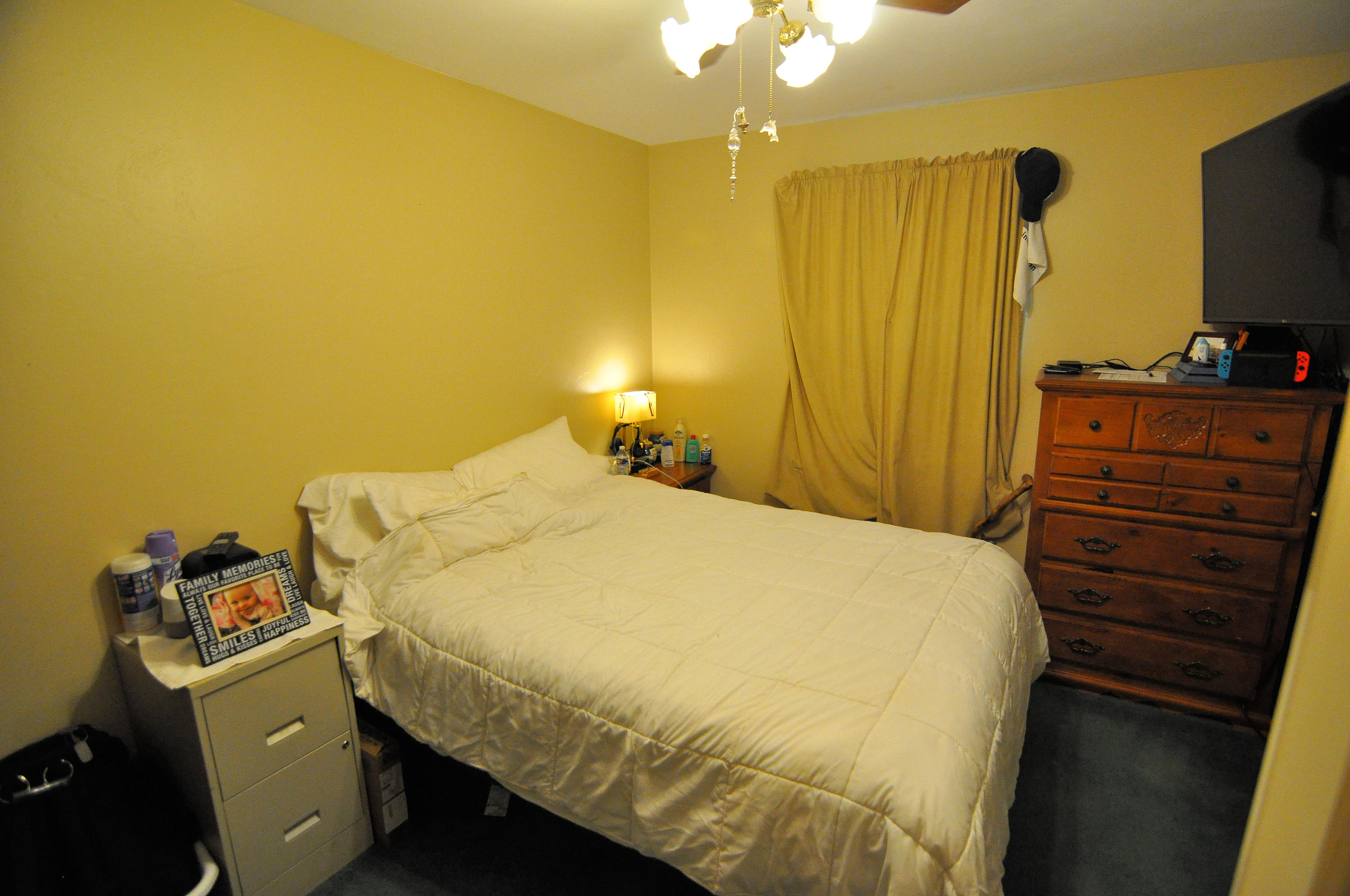 570 Zimmerman Road Blue Ridge, VA 24064 - Photo 22 of 24 a bedroom with a bed and wooden floor