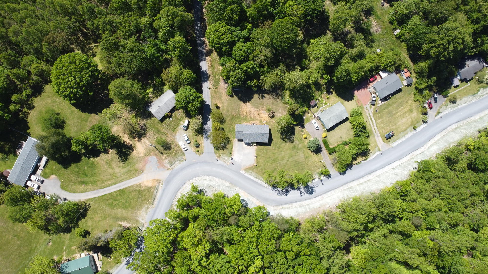 570 Zimmerman Road Blue Ridge, VA 24064 - Photo 6 of 24 an aerial view of residential houses with outdoor space and trees all around