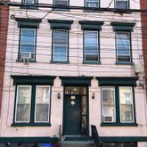 a front view of a house with a window