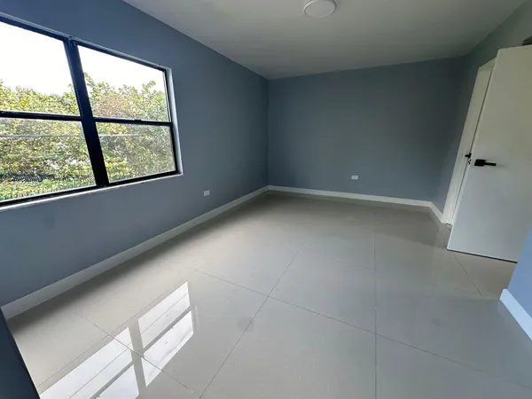 an empty room with a window
