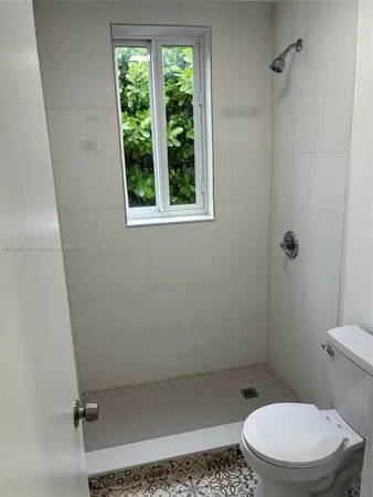 a bathroom with a toilet