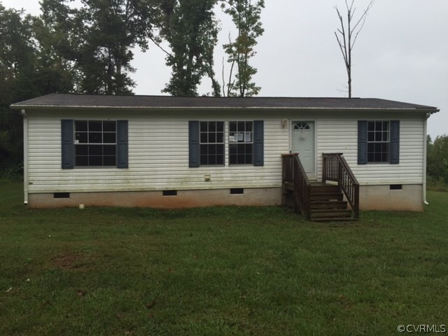 2012 Trivette Road Beaverdam, VA 23015 - Photo 1 of 11 a house that has a tree in front of it