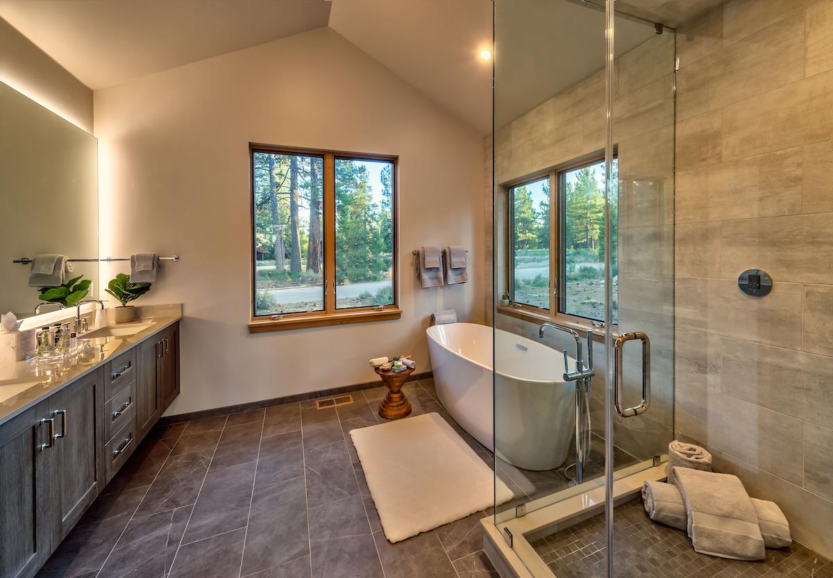 11355 Sutter's Trail, Unit 16 Truckee, CA 96161 - Photo 17 of 21 a bathroom with a tub sink and mirror