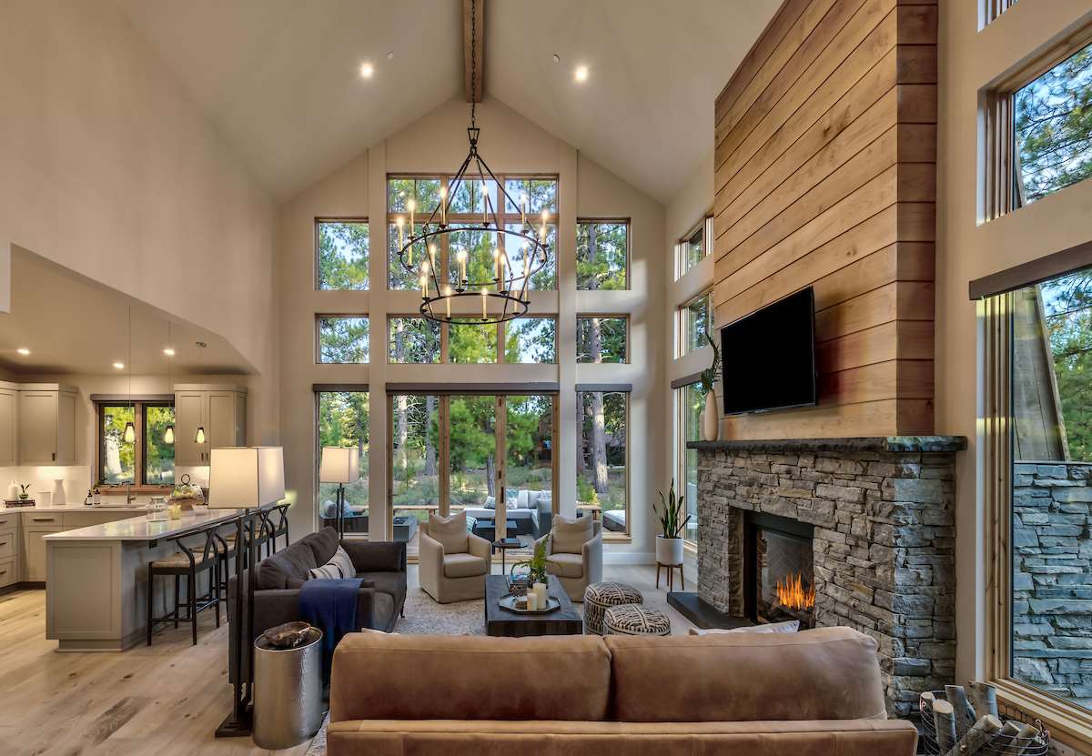 11355 Sutter's Trail, Unit 16 Truckee, CA 96161 - Photo 3 of 21 a living room with furniture a fireplace and a flat screen tv