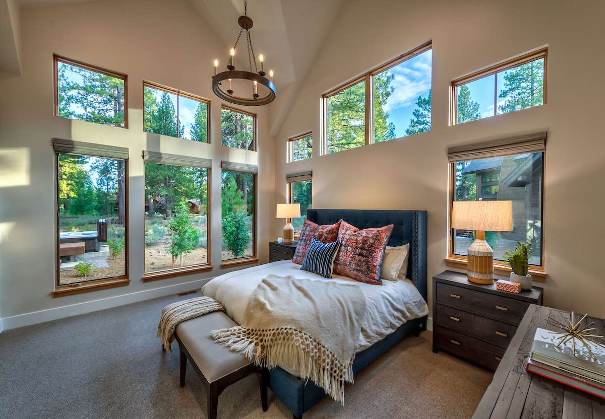 11355 Sutter's Trail, Unit 16 Truckee, CA 96161 - Photo 10 of 21 a bedroom with a large bed and a window