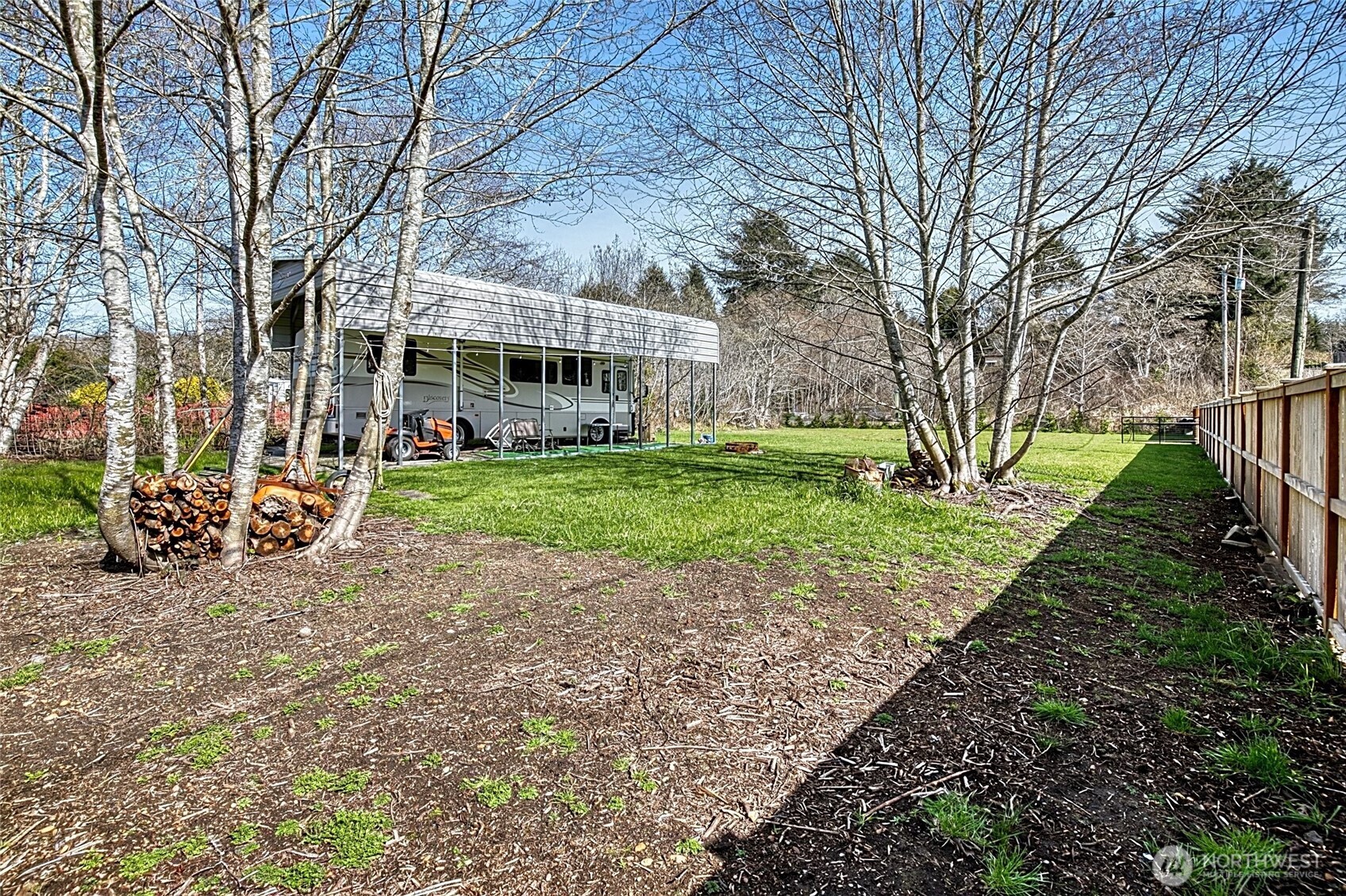 10 5th Avenue Copalis Beach, WA 98535 - Photo 5 of 13 a view of a house with a yard