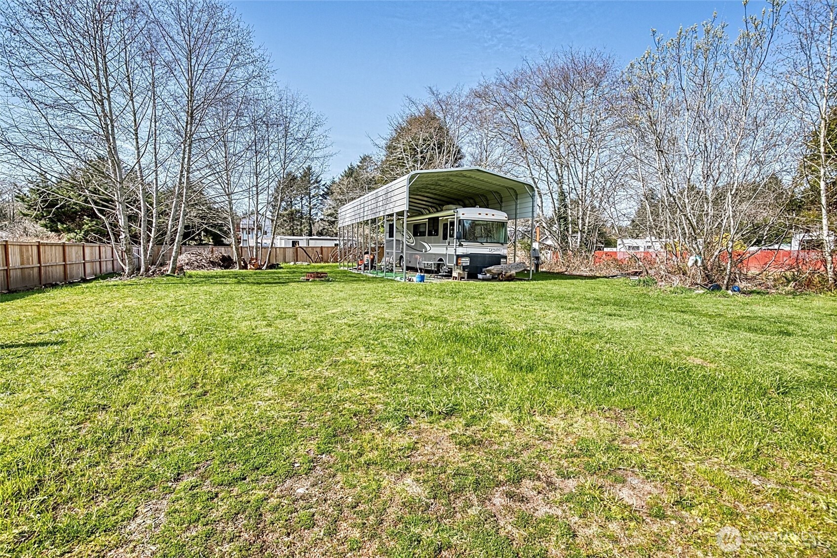 10 5th Avenue Copalis Beach, WA 98535 - Photo 9 of 13 a view of a house with a yard