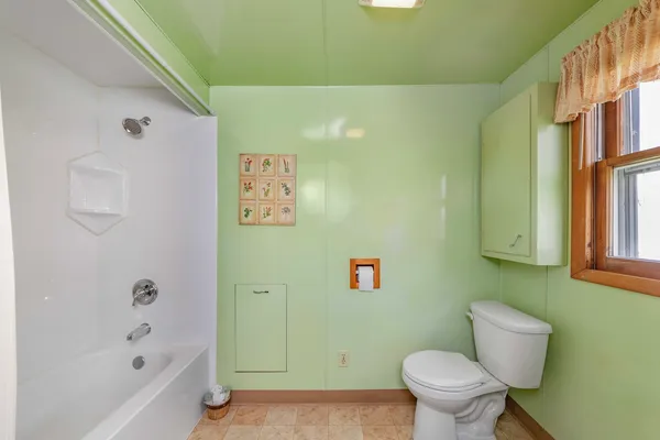a bathroom with a sink and a toilet