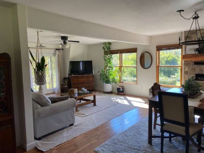 4243 Beech Log Road Lebanon, TN 37090 - Photo 14 of 36 a living room with furniture a fireplace and a window