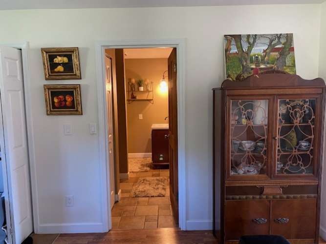 4243 Beech Log Road Lebanon, TN 37090 - Photo 17 of 36 a view of a hallway with wooden floor and closet