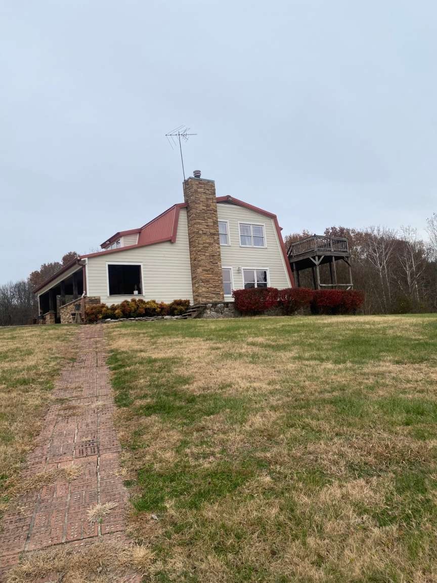 4243 Beech Log Road Lebanon, TN 37090 - Photo 2 of 36 a view of a house with a big yard
