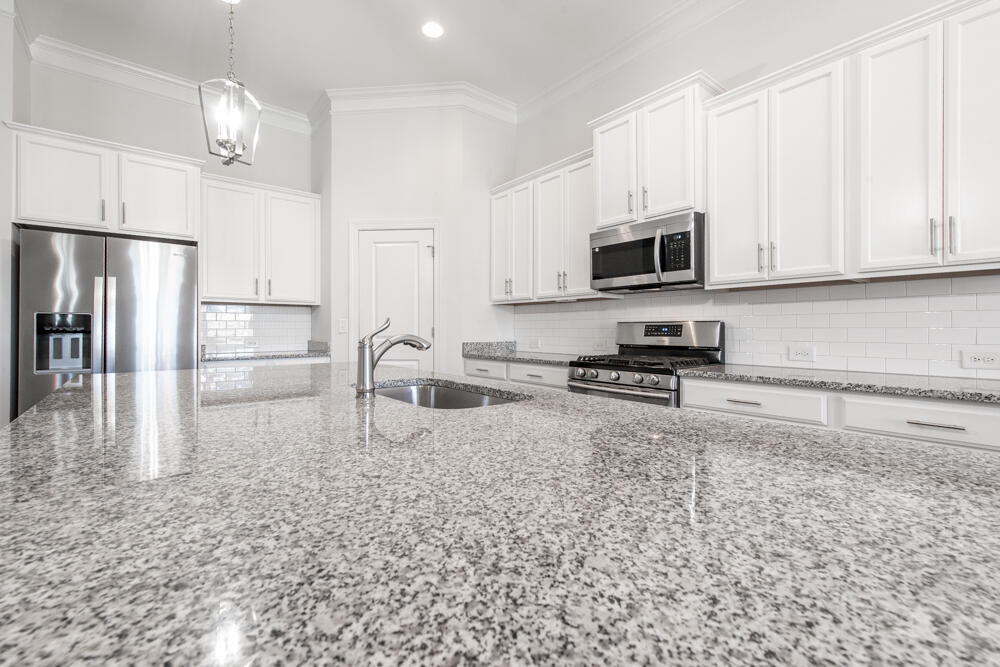 142 Fitzsimmon's Drive North Augusta, SC 29860 - Photo 6 of 36 Tiled Backsplash & Granite Countertops!