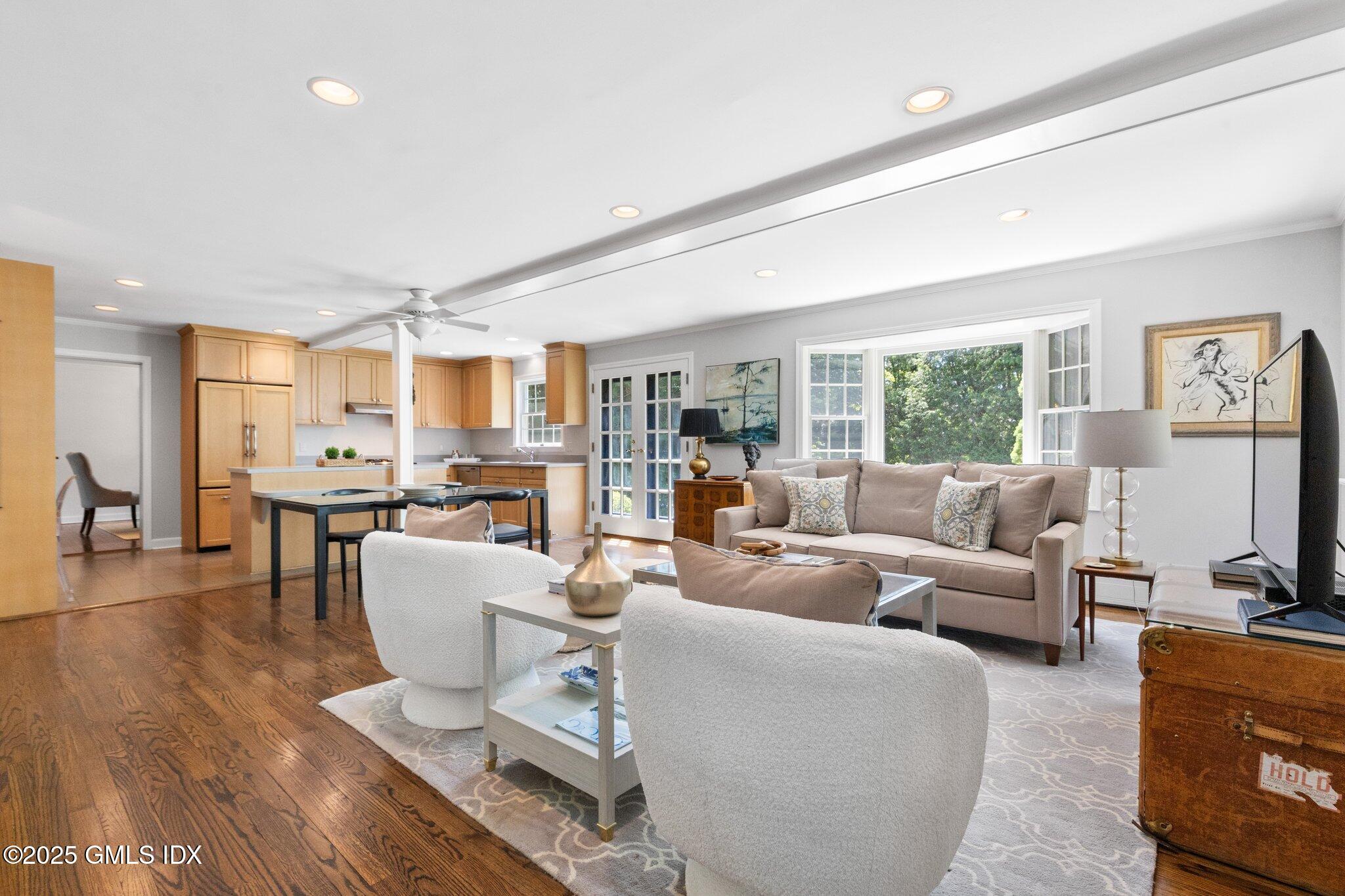 16 Verona Drive Riverside, CT 06878 - Photo 11 of 25 a living room with furniture wooden floor and a large window