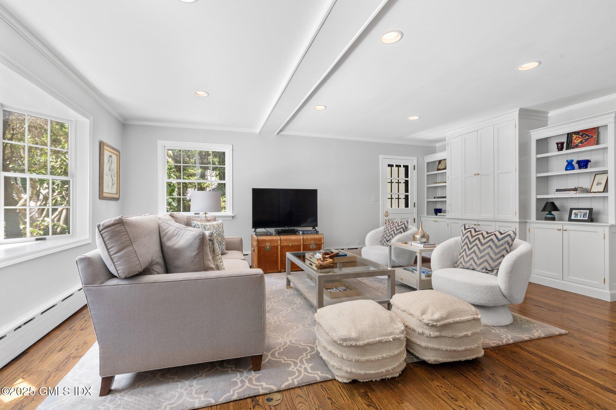 16 Verona Drive Riverside, CT 06878 - Photo 12 of 25 a living room with furniture and a flat screen tv