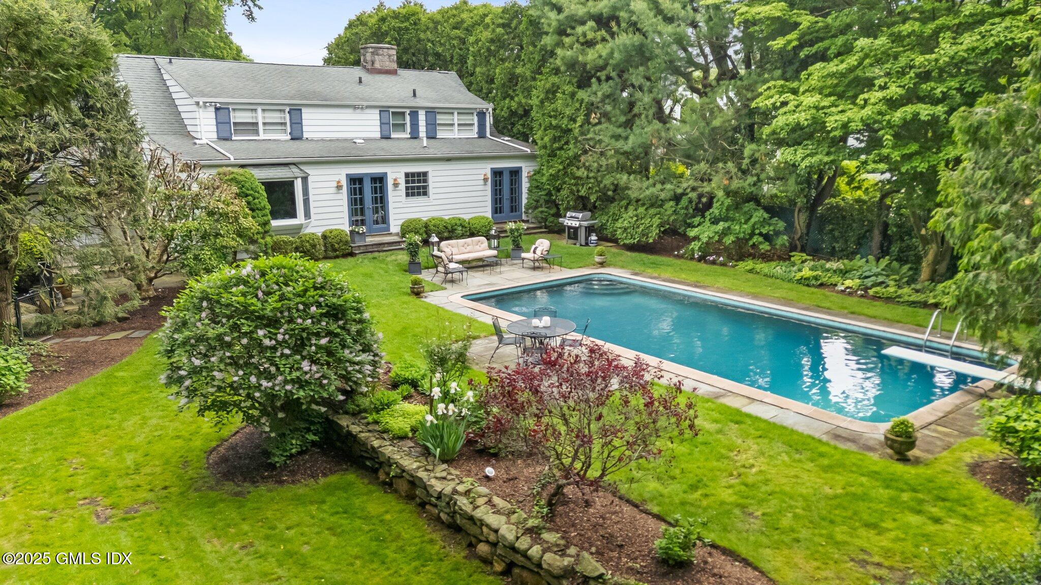 16 Verona Drive Riverside, CT 06878 - Photo 2 of 25 a view of a house with swimming pool