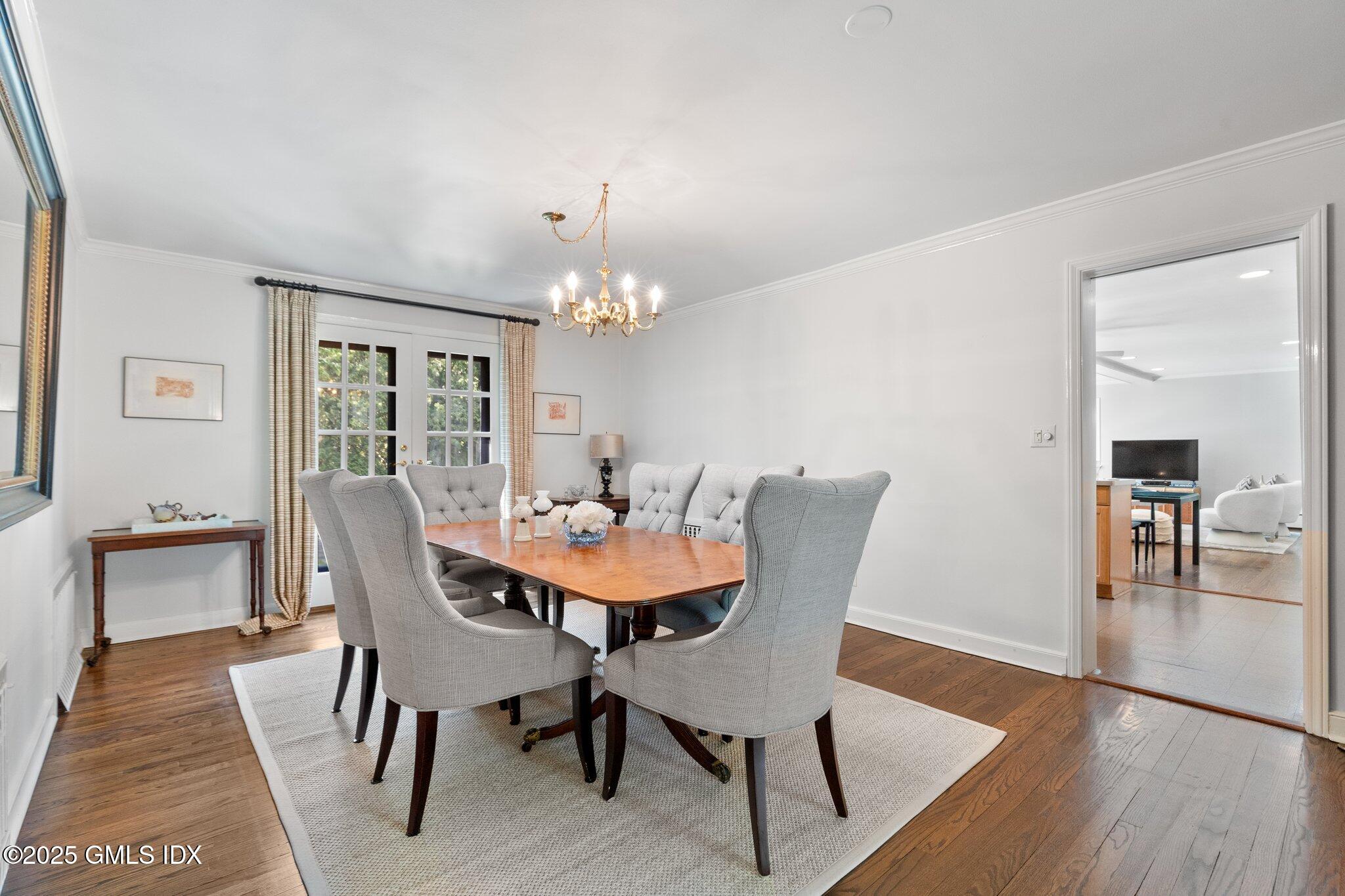 16 Verona Drive Riverside, CT 06878 - Photo 7 of 25 a view of a dining room with furniture and wooden floor